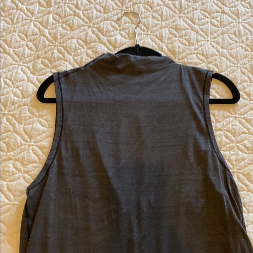Slight mid neck thin Tank with a semi open back